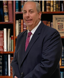 Marc  E. Henig